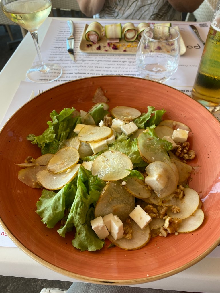 Salad with potatoes, walnuts and cheese.